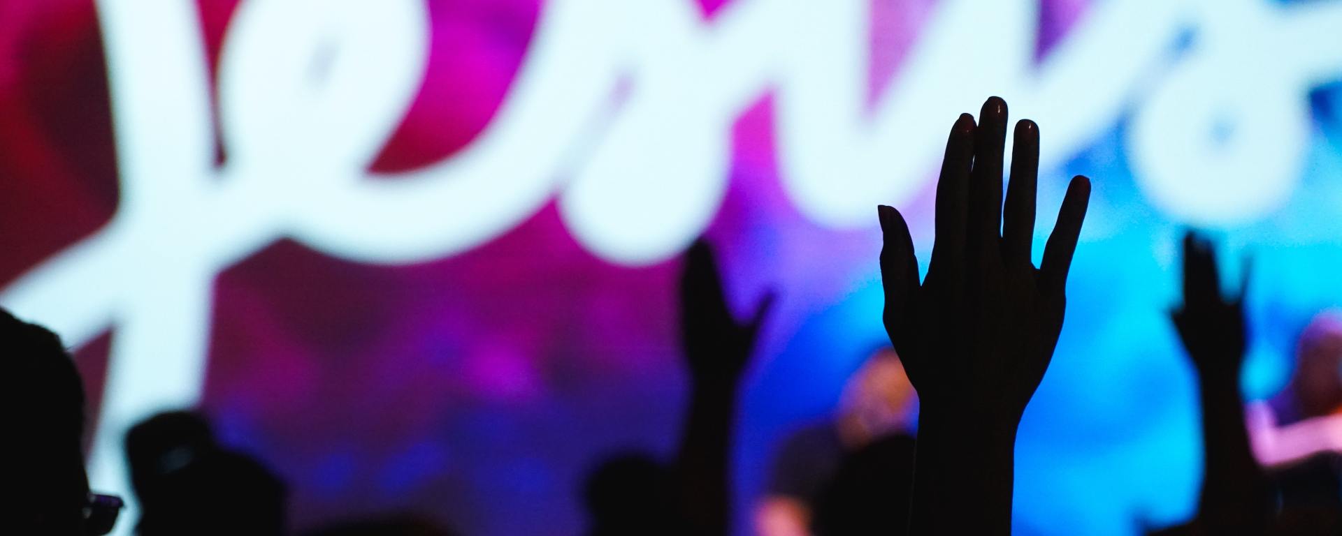 Lifted hands in worship of Jesus
